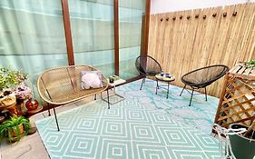 Locatelli Apartments - Patio Living 